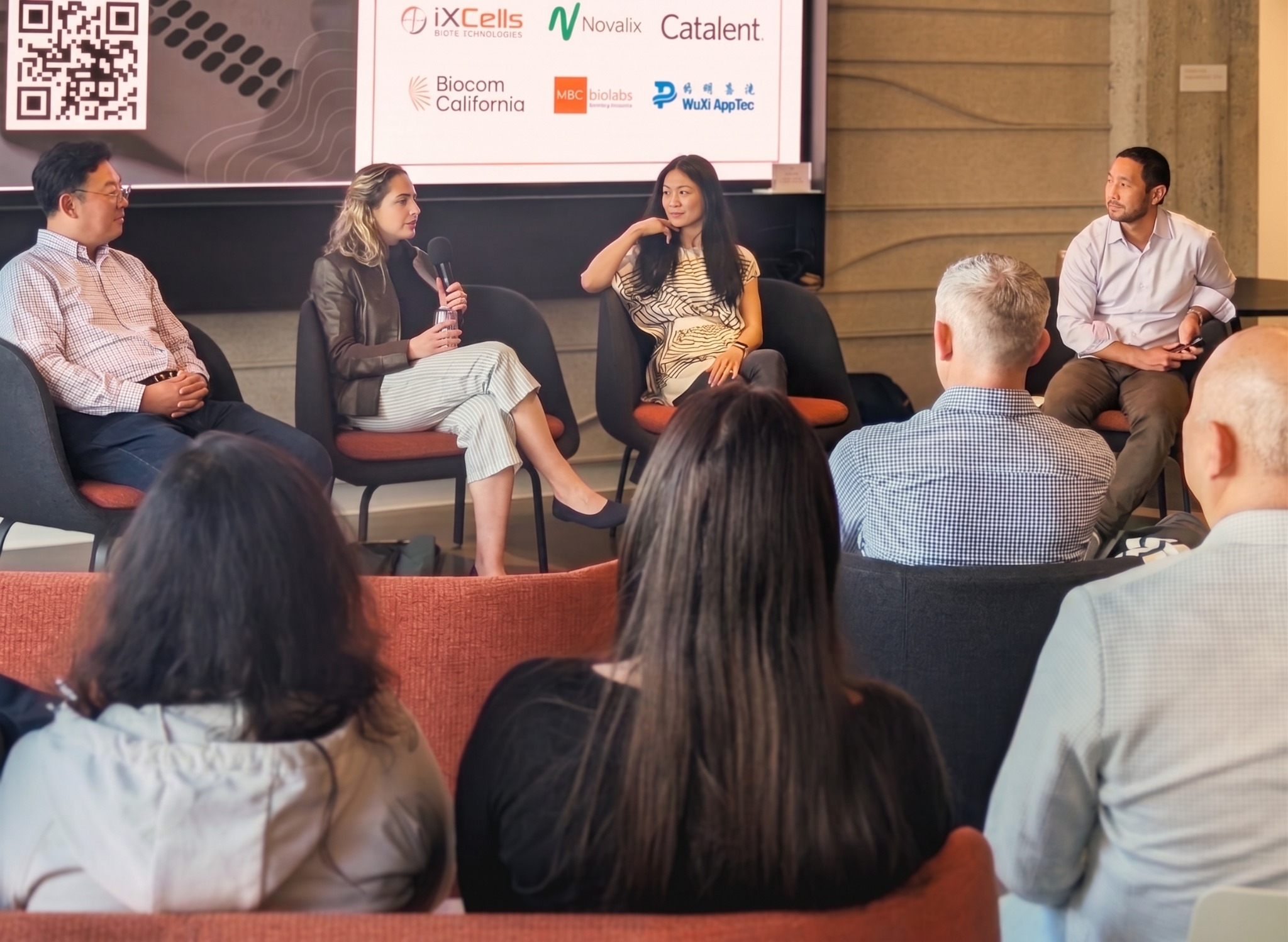 Helen Chen and fellow panelists discussing global life-science innovation at MBC BioLabs